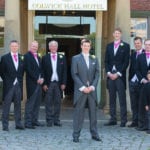 karl bratby photographer.068 Photo of Bride and his nine Brides men in front of Colwick Hall Hotel Reception.